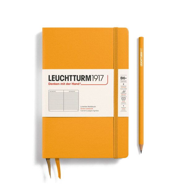 Rising sun yellow hardcover ruled notebook with 2 bookmarks, with thin fabric strap closure.